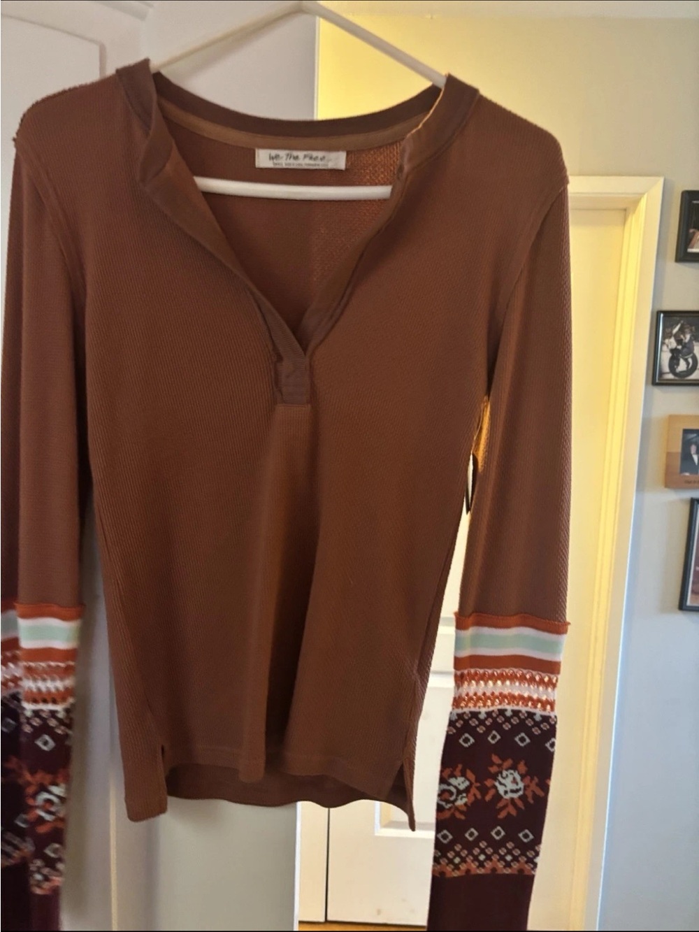 Free people.    We The Free Brown Waffle Henley with Patterned Cuffs